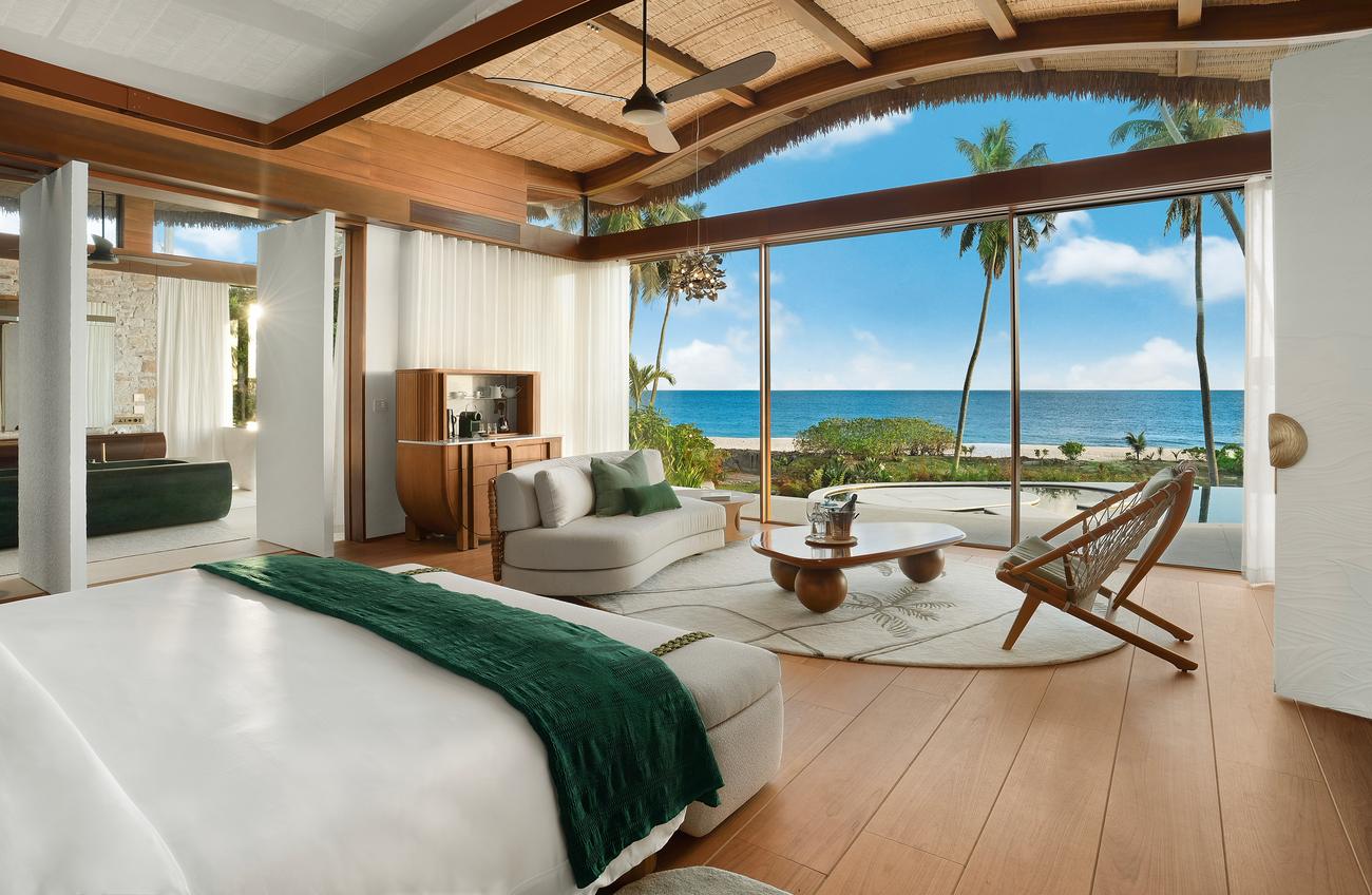 Bedroom with floor-to-ceiling ocean views