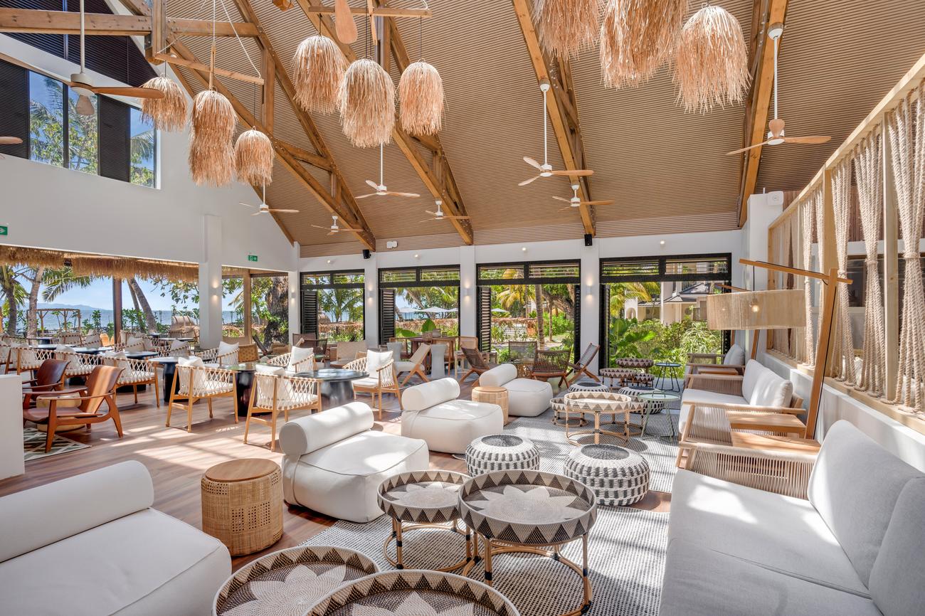 Open-sided lounge with woven pendant lights